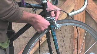 How to Build a Single Speed Bike 5Remove the Brakes [upl. by Anual]