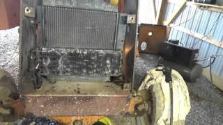 How to put a new radiator in a Case 580C backhoe [upl. by Adnoryt911]