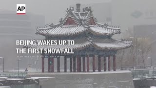 Beijing wakes up to the first snowfall of the Olympics [upl. by Reiners693]