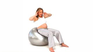 Pregnant Woman Exercising on Gym Ball Video  WaveBreak Media [upl. by Restivo763]