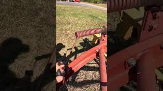 Raking hay with a 256 rolabar hay rake farming [upl. by Gnouhp]