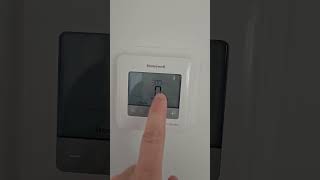 How to turn on auto setting on Honeywell Pro Series thermostat [upl. by Ahseekan]