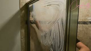 Easily removing hard water stains from shower glass door [upl. by Lamaj]