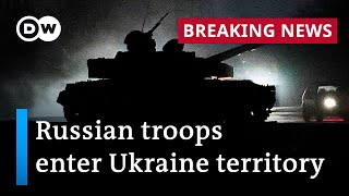 Russia peacekeeping forces march into Ukraine separatist regions  DW News [upl. by Eanert]