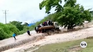 Raging river in Kenya carries away truckload of people  VOA News [upl. by Ynavoj]