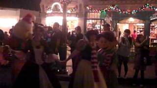 Disney Characters on Christmas Eve at Disneyland walking up to Main Street Station 2010 [upl. by Atiuqahc]