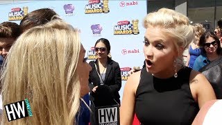 Emily Osment Talks Young and Hungry Make Out Scene [upl. by Connett]