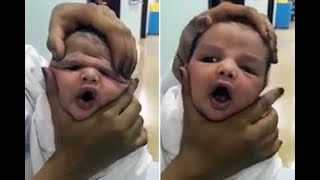 Fury over video of baby’s face squashed by laughing nurses amid calls to JAIL them [upl. by Inirt]