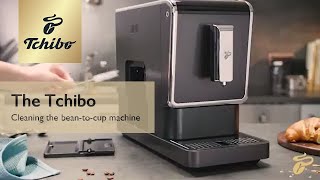 How to clean coffee machine with grinder – The Tchibo cleaning coffee brewing unit [upl. by Arvin]