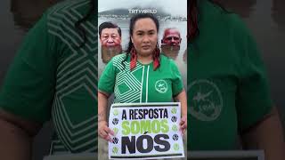 Indigenous protesters in Brazil sink cutouts of G20 leaders to demand climate action [upl. by Auqined250]