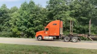 Mack RD dump truck International 9400I hauling an empty log trailer [upl. by Imnubulo]