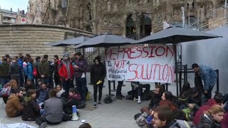 Protesters gather in front of the Sagrada Família [upl. by Erelia]