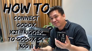 HOW TO CONNECT THE GODOX X2T TRIGGER TO THE GODOX SK 300 II [upl. by Auerbach]