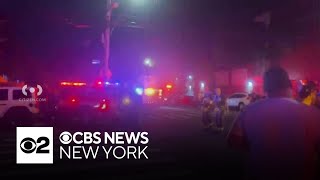 Raging Bronx fire leaves 2 men in critical condition [upl. by Litnahs]