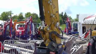 OilQuick Demo Cat 324D on MaskinExpo 2010 [upl. by Shurwood]