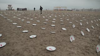 Empty plates displayed on Rio beach to urge G20 leaders to end global hunger  AFP [upl. by Lauren]