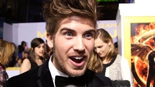 Joey Graceffa Talks ALMOST Being Finnick at Mockingjay Pt 1 Premiere [upl. by Yecak]