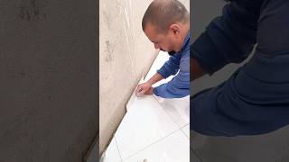 Installing ceramic tile sides on walls to prevent moisture [upl. by Ardnosak]