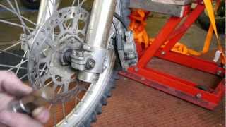 DRZ 400  Front wheel removal  refit [upl. by Droffig63]