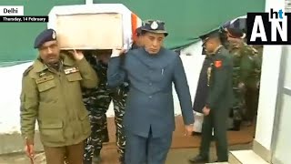 Pulwama attack Rajnath Singh helps carry coffin of CRPF jawan in Kashmir [upl. by Anuahsal]