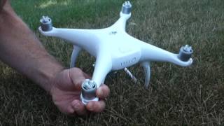 Battery and Propeller Installation DJI Phantom 4 [upl. by Ymma415]