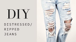 HOW TO  DIY Distressed  Ripped Jeans Tutorial [upl. by Wilfreda]