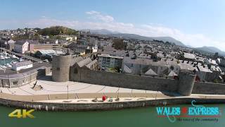 Caernarfon Castle drone  4K Ultra Video HD [upl. by Ilatan280]