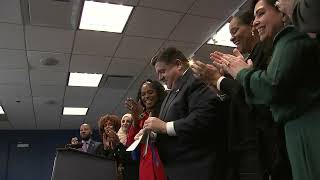 Illinois Gov JB Pritzker signs expansive paid leave legislation into law [upl. by Ledba]