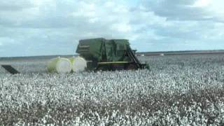 John Deere 7760 with McCormack Industries Bale Trailer  Ejecting Bale 1 [upl. by Reisfield]