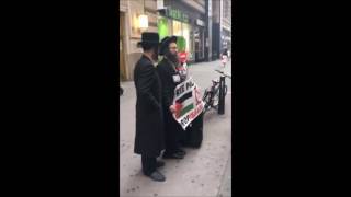 Chassidish Yungerman Deals With Neturei Karta In Manhattan [upl. by Llig522]