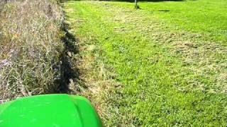 John Deere X728 Mowing Tall Grass [upl. by Eadith]