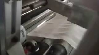 Fully automatic gauze bandage Rolling machine [upl. by Tatiana]