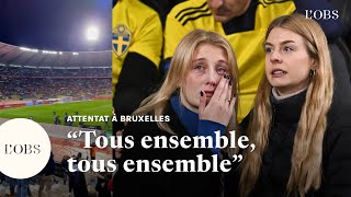 Attentat à Bruxelles  lélan de solidarité des supporters belges avec les Suédois [upl. by Okemak]