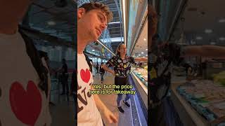 Tasting fresh fish at a market while speaking Catalan [upl. by Bigford121]