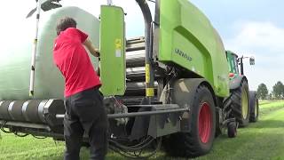 balen persen met john deere 6330 samen met claas rollant 455 uniwrap [upl. by Eidoj]