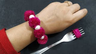 DIY Woolen Pom pom Bracelet using Fork  Amazing Craft with wool [upl. by Honan]