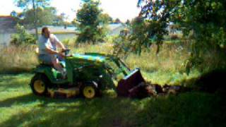 John Deere X728 WCompact Tractor loader [upl. by Fillbert]