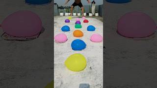 The balloon man pops water balloons randomly reversely jumping trending sports challenge race [upl. by Eicrad92]