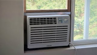 Installing an air conditioner in a sliding window [upl. by Dlaniger]