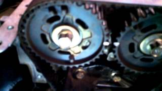 Timing belt replacement 1998  2003 Mazda Protege DOHC 16L water pump Install Remove Replace [upl. by Lyrehc]