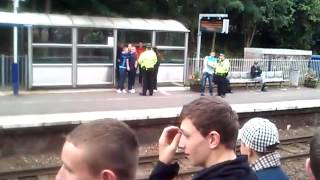 Motherwell fans at Hamilton train station [upl. by Naraa291]