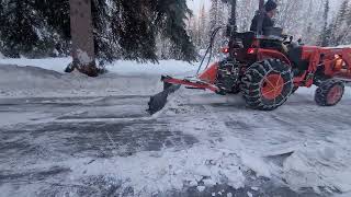 Rear blade in action and peeling up the packed snow [upl. by Harbert]