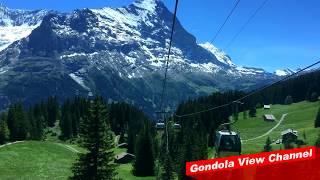 Cable car view of the Eiger north face in the Swiss Alps  Firstbahn HD [upl. by Goldin]