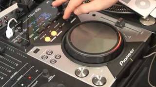 DJmag Review  Pioneer CDJ400 [upl. by Yemarej]