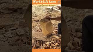 A craftsman carves a wooden bowl with an adze refining its shape and smoothing the surface [upl. by Solomon268]