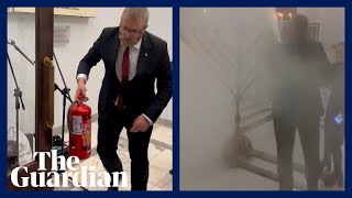 Farright Polish MP extinguishes Hanukkah candles in parliament [upl. by Amikahs]