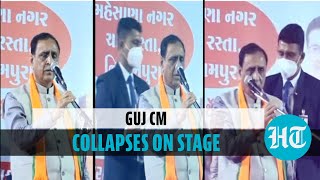 Watch Gujarat CM faints on stage during rally PM Modi calls to check on him [upl. by Corabel]