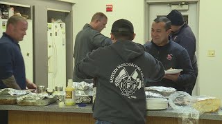 Away from their families first responders share Thanksgiving dinner [upl. by Augustus323]