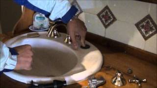 How to fix a leaking faucet change washer and reseat tap [upl. by Arodal]