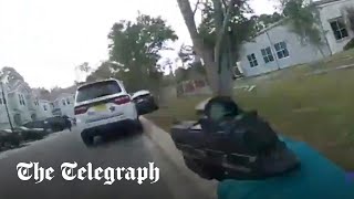 US police officer shoots at unarmed suspect after mistaking acorn drop for gunshot [upl. by Eilliw128]